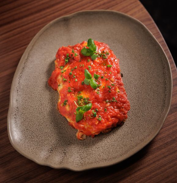 Milanesa de bife de chorizo napolitana